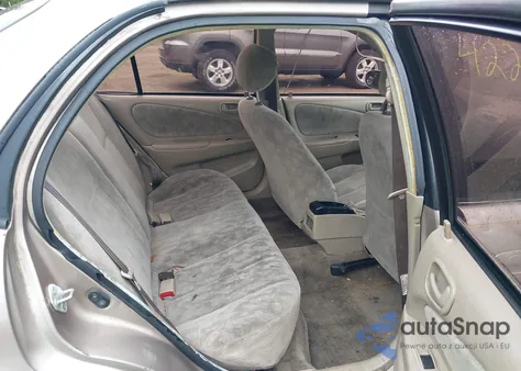 1999 Toyota Corolla Le из США, поврежденный, VIN 2T1BR12E9XC204275